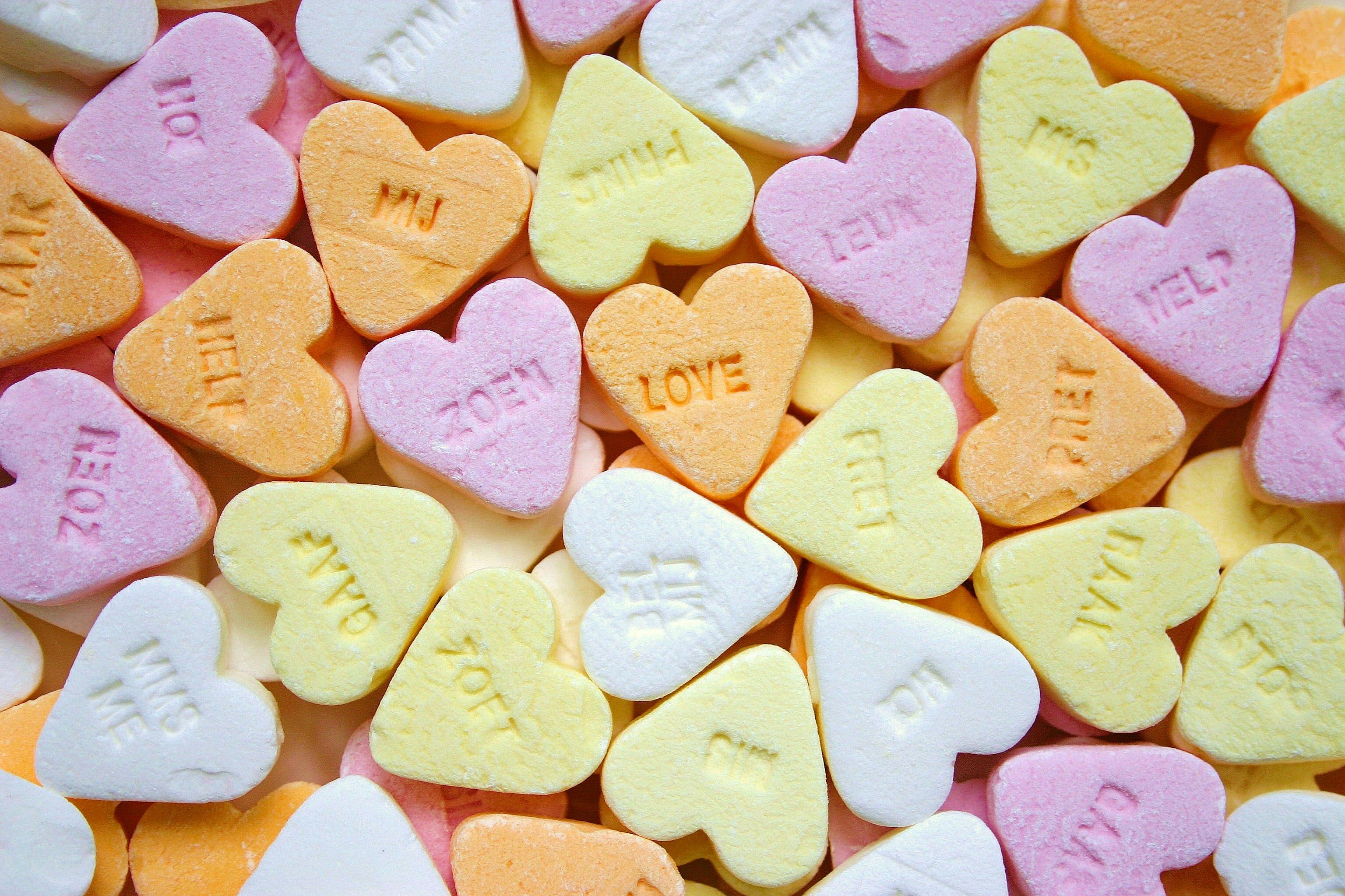 Pastel heart-shaped sweets arranged together